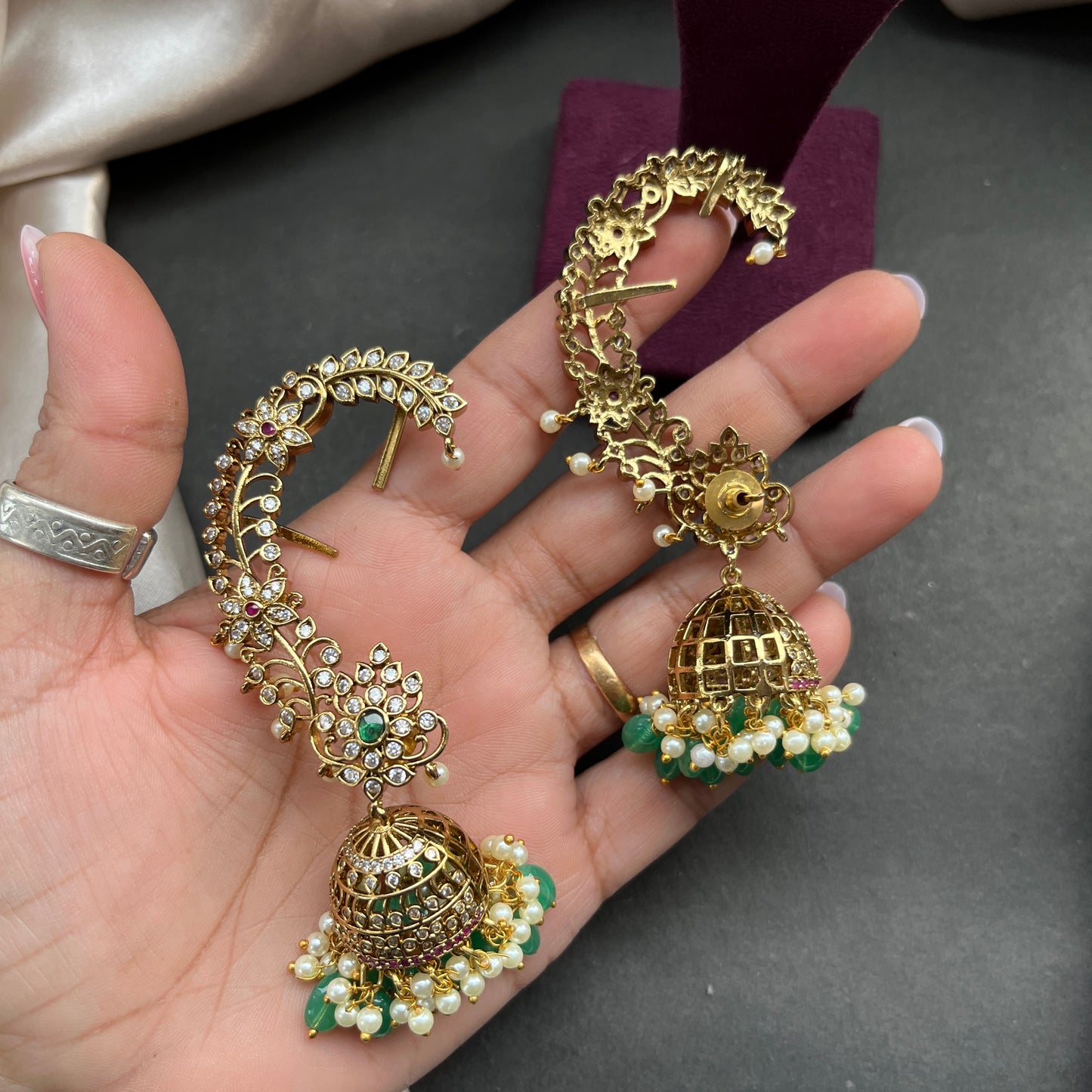 Traditional gold look South Indian stud earrings imitation jewelry with temple design motifs,Gold finish South Indian kemp earrings classic design with colorful stones for traditional outfits,South Indian gold tone jhumka earrings intricate detailing, perfect for festive and bridal wear