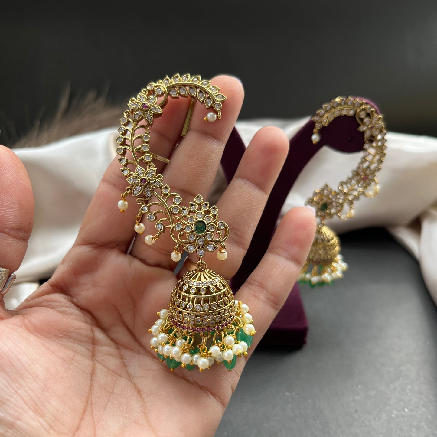 Traditional gold look South Indian stud earrings imitation jewelry with temple design motifs,Gold finish South Indian kemp earrings classic design with colorful stones for traditional outfits,South Indian gold tone jhumka earrings intricate detailing, perfect for festive and bridal wear