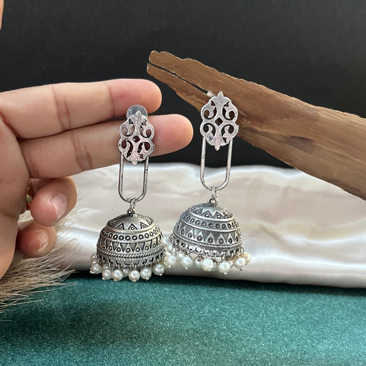 German silver look jhumka earrings oxidised finish with intricate temple design, perfect for festive wear,Vintage German silver look hoop earrings boho inspired design for casual and traditional wear