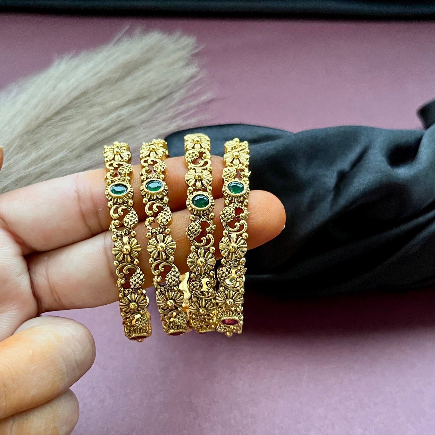Traditional gold tone bangles with carved detailing imitation jewelry for weddings.Glossy gold look bangles in classic design party wear imitation bangles for women