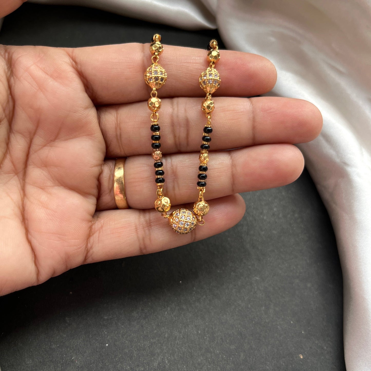 diamond mangalsutra,mangalsutra designs,wedding jewelry,black beads necklace,mangalsutra,mangalsutra designs,designer mangalsutra black beads,modern mangalsutra black beads,buy mangalsutra online black beads,mangalsutra price black beads,lightweight mangalsutra black beads