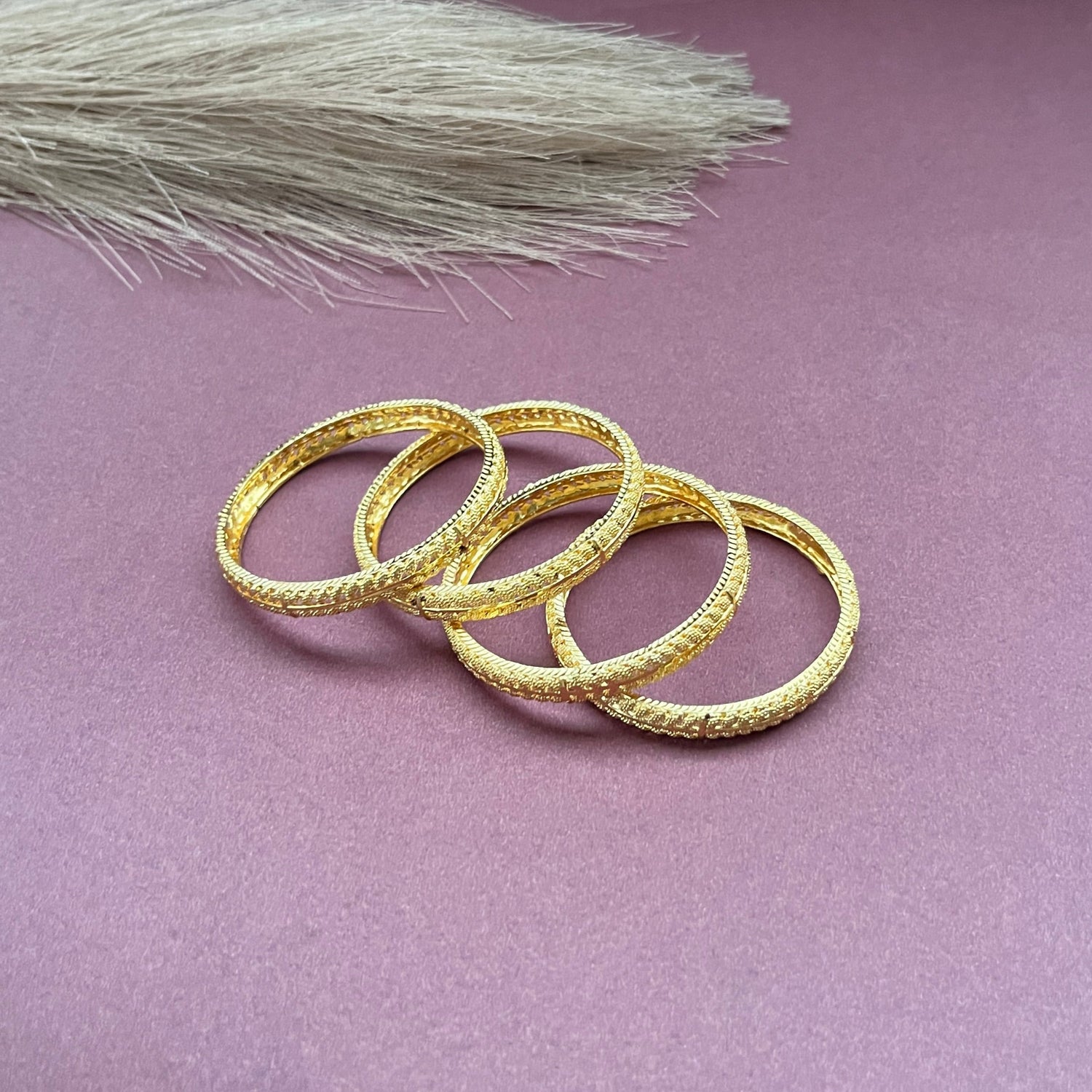
Gold look alike,Imitation jewelry,Bridal / party wear,Openable / antique / temple design,Artificial bangles