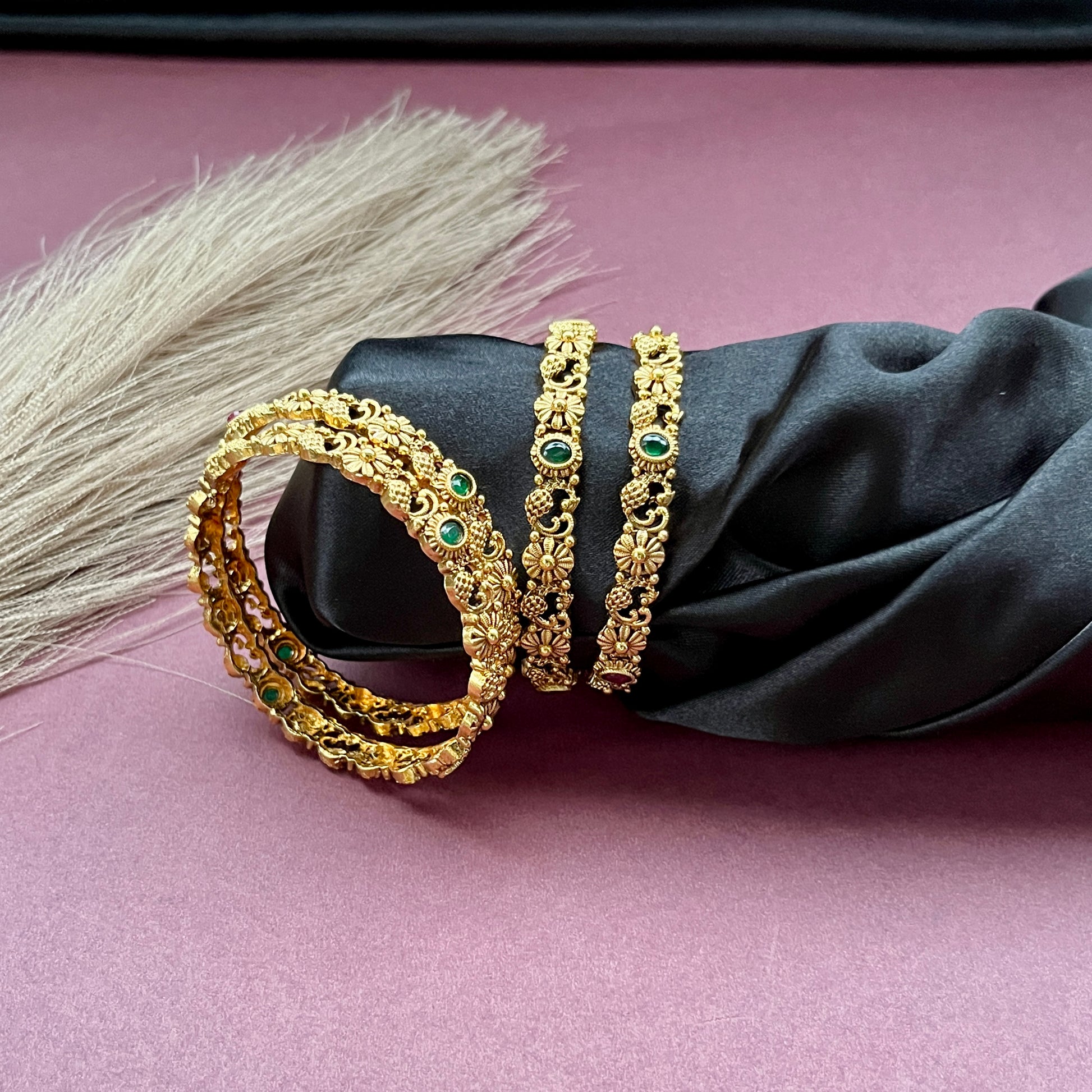 Traditional gold tone bangles with carved detailing imitation jewelry for weddings.Glossy gold look bangles in classic design  party wear imitation bangles for women