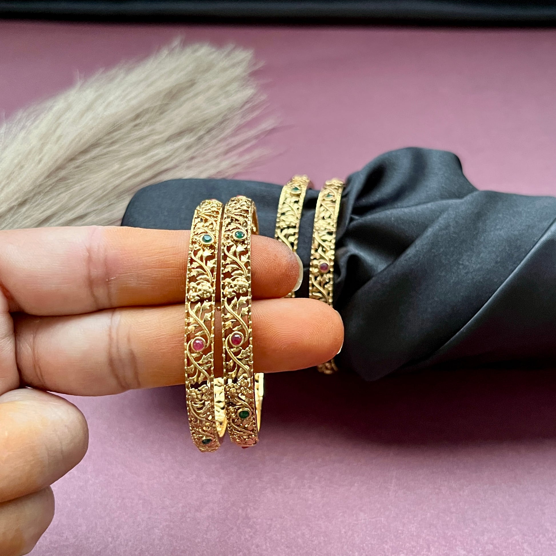 Traditional gold tone bangles with carved detailing imitation jewelry for weddings.Glossy gold look bangles in classic design  party wear imitation bangles for women