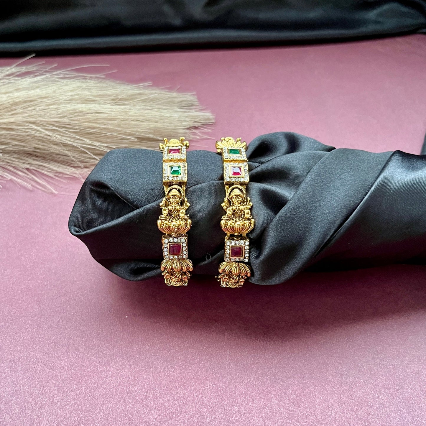 Traditional gold tone bangles with carved detailing imitation jewelry for weddings.Glossy gold look bangles in classic design  party wear imitation bangles for women