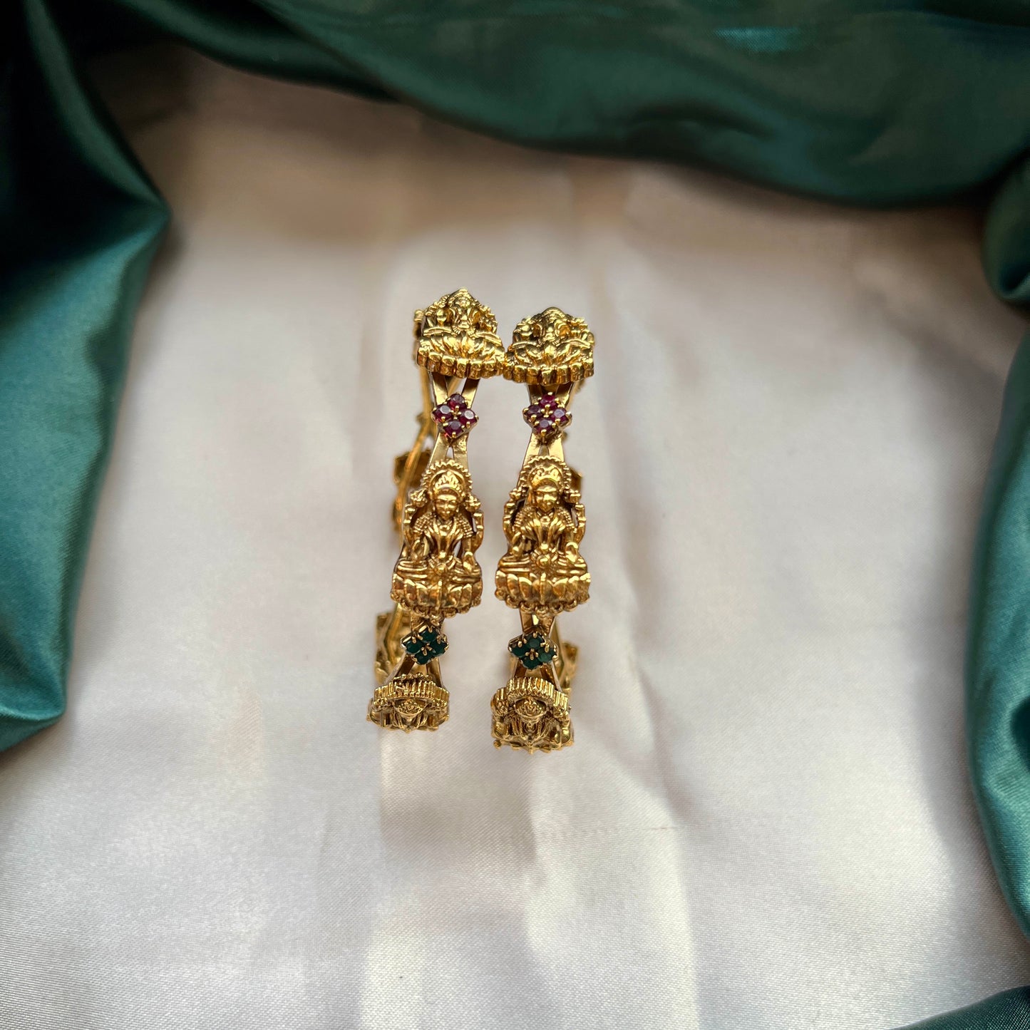 Traditional gold tone bangles with carved detailing imitation jewelry for weddings.Glossy gold look bangles in classic design  party wear imitation bangles for women
