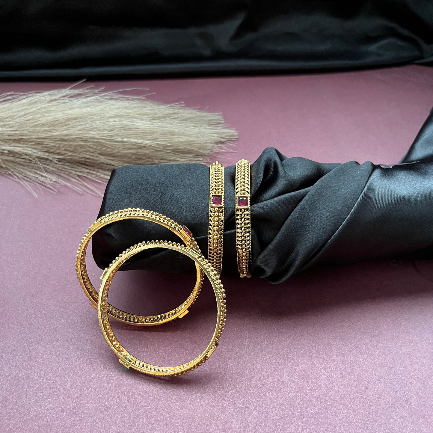 Traditional gold tone bangles with carved detailing imitation jewelry for weddings.Glossy gold look bangles in classic design  party wear imitation bangles for women