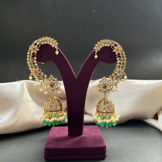 Traditional gold look South Indian stud earrings imitation jewelry with temple design motifs,Gold finish South Indian kemp earrings classic design with colorful stones for traditional outfits,South Indian gold tone jhumka earrings intricate detailing, perfect for festive and bridal wear