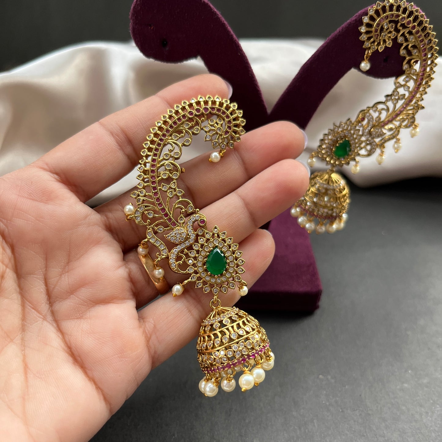 Traditional gold look South Indian stud earrings imitation jewelry with temple design motifs,Gold finish South Indian kemp earrings classic design with colorful stones for traditional outfits,South Indian gold tone jhumka earrings intricate detailing, perfect for festive and bridal wear