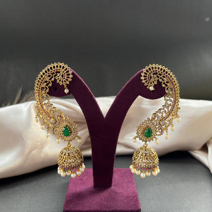 Traditional gold look South Indian stud earrings imitation jewelry with temple design motifs,Gold finish South Indian kemp earrings classic design with colorful stones for traditional outfits,South Indian gold tone jhumka earrings intricate detailing, perfect for festive and bridal wear