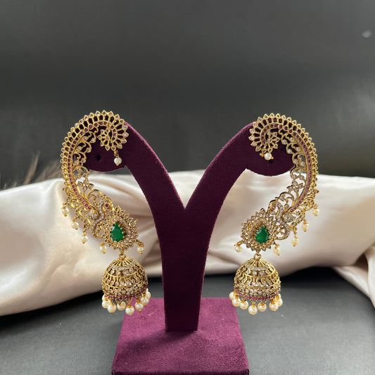 Traditional gold look South Indian stud earrings imitation jewelry with temple design motifs,Gold finish South Indian kemp earrings classic design with colorful stones for traditional outfits,South Indian gold tone jhumka earrings intricate detailing, perfect for festive and bridal wear
