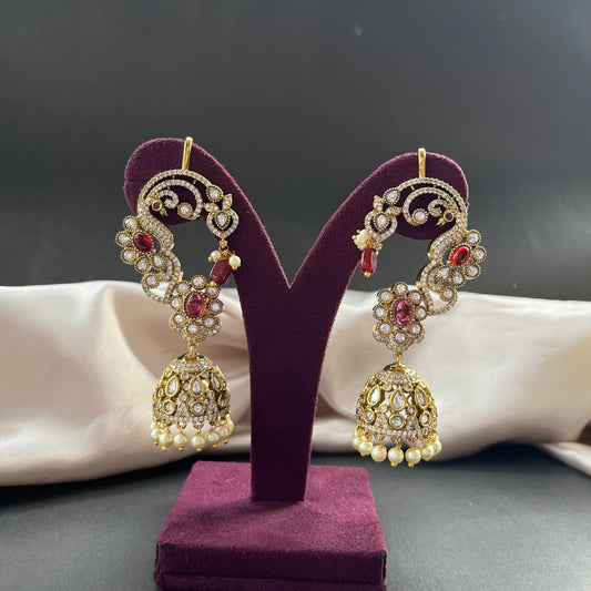 Traditional gold look South Indian stud earrings imitation jewelry with temple design motifs,Gold finish South Indian kemp earrings classic design with colorful stones for traditional outfits,South Indian gold tone jhumka earrings intricate detailing, perfect for festive and bridal wear