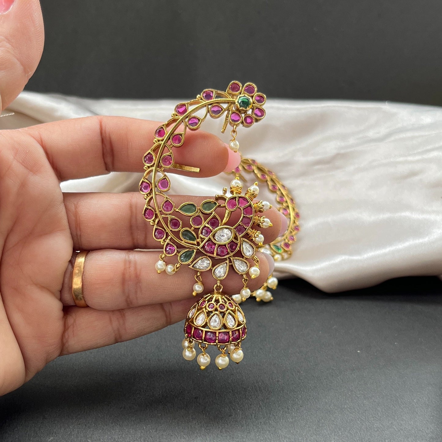 Traditional gold look South Indian stud earrings imitation jewelry with temple design motifs,Gold finish South Indian kemp earrings classic design with colorful stones for traditional outfits,South Indian gold tone jhumka earrings intricate detailing, perfect for festive and bridal wear