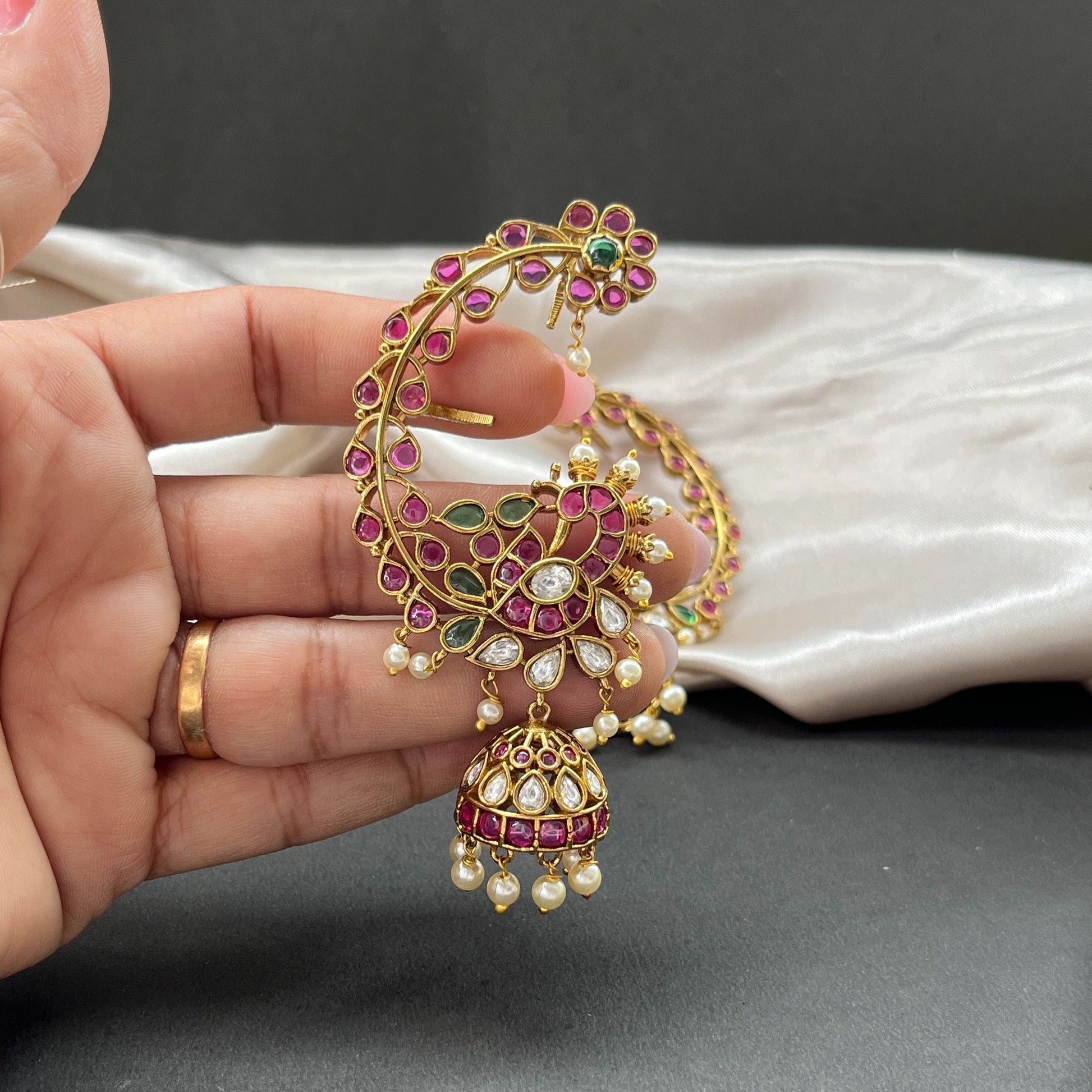 Traditional gold look South Indian stud earrings imitation jewelry with temple design motifs,Gold finish South Indian kemp earrings classic design with colorful stones for traditional outfits,South Indian gold tone jhumka earrings intricate detailing, perfect for festive and bridal wear