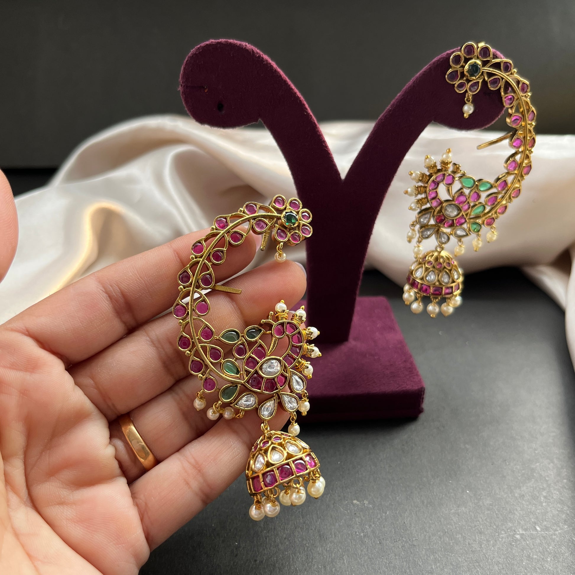 Traditional gold look South Indian stud earrings imitation jewelry with temple design motifs,Gold finish South Indian kemp earrings classic design with colorful stones for traditional outfits,South Indian gold tone jhumka earrings intricate detailing, perfect for festive and bridal wear