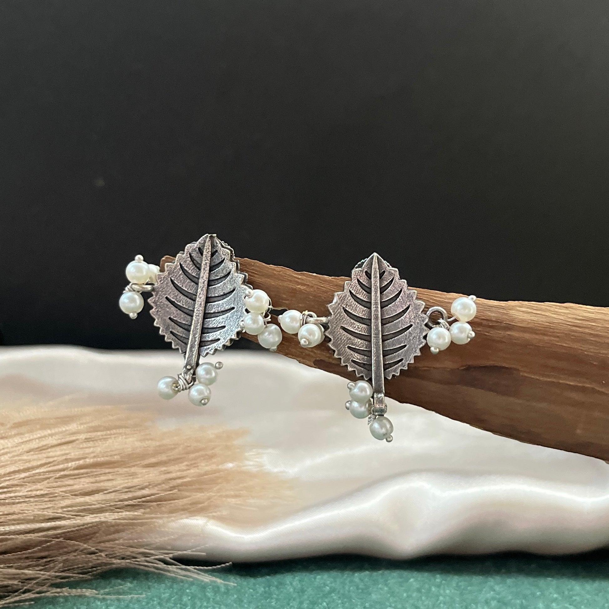 German silver look jhumka earrings oxidised finish with intricate temple design, perfect for festive wear,Vintage German silver look hoop earrings  boho inspired design for casual and traditional wear