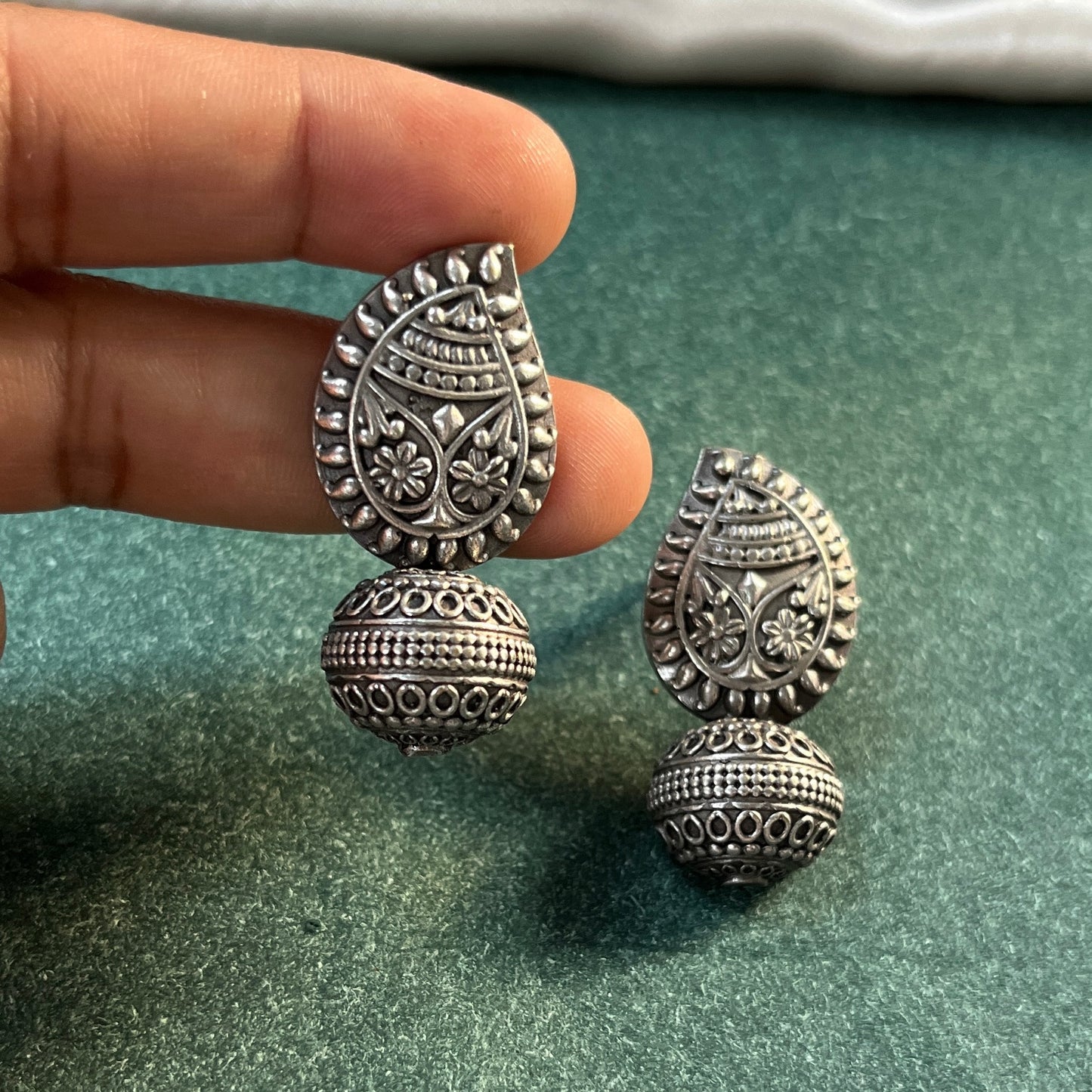 German silver look jhumka earrings oxidised finish with intricate temple design, perfect for festive wear,Vintage German silver look hoop earrings  boho inspired design for casual and traditional wear