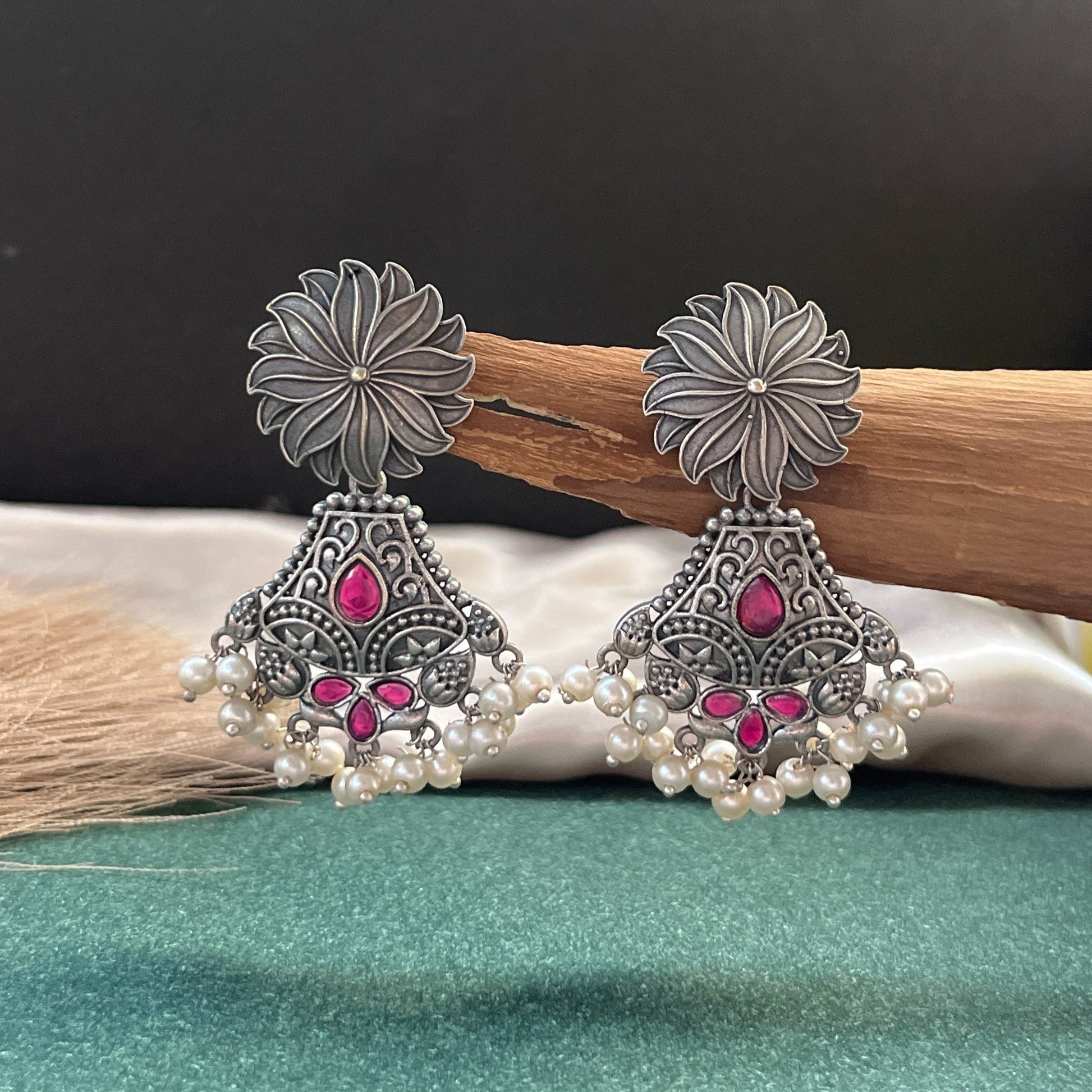 German silver look jhumka earrings oxidised finish with intricate temple design, perfect for festive wear,Vintage German silver look hoop earrings  boho inspired design for casual and traditional wear