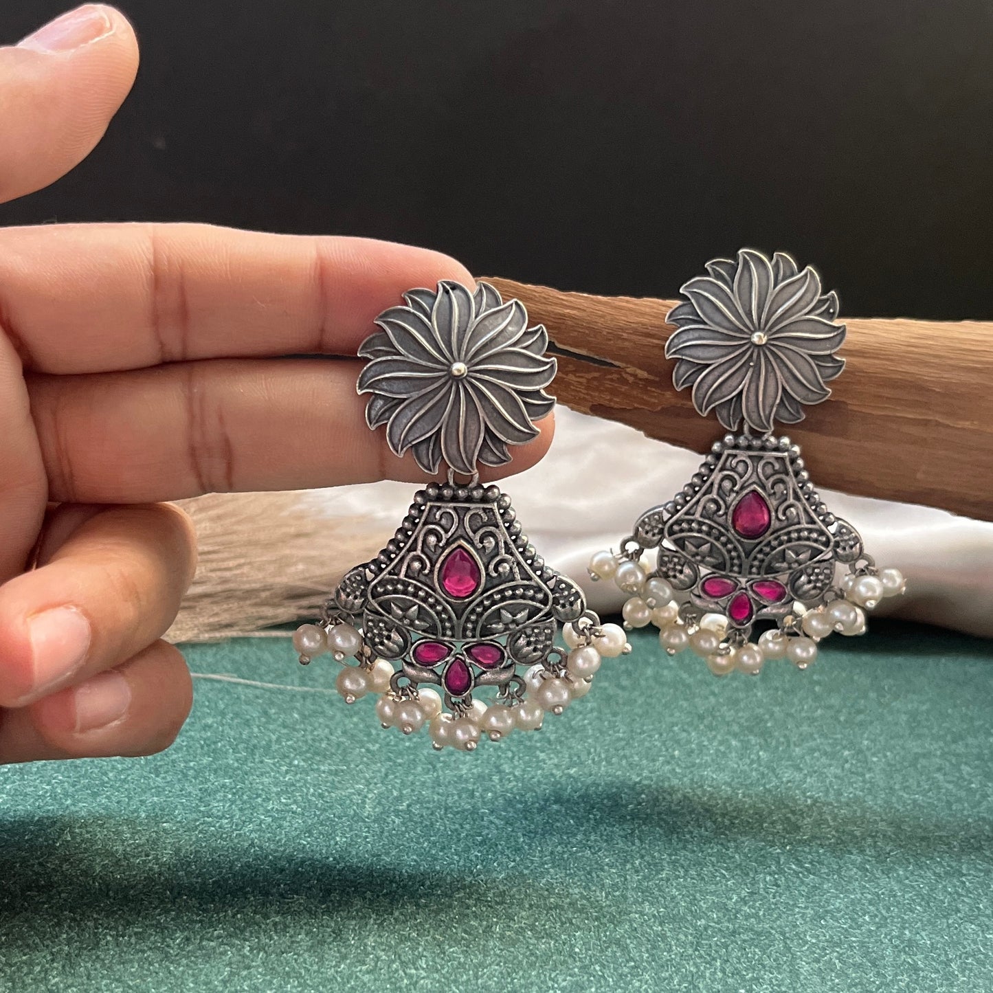 German silver look jhumka earrings oxidised finish with intricate temple design, perfect for festive wear,Vintage German silver look hoop earrings  boho inspired design for casual and traditional wear