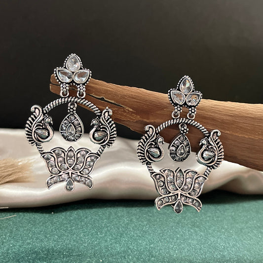 German silver look jhumka earrings oxidised finish with intricate temple design, perfect for festive wear,Vintage German silver look hoop earrings  boho inspired design for casual and traditional wear