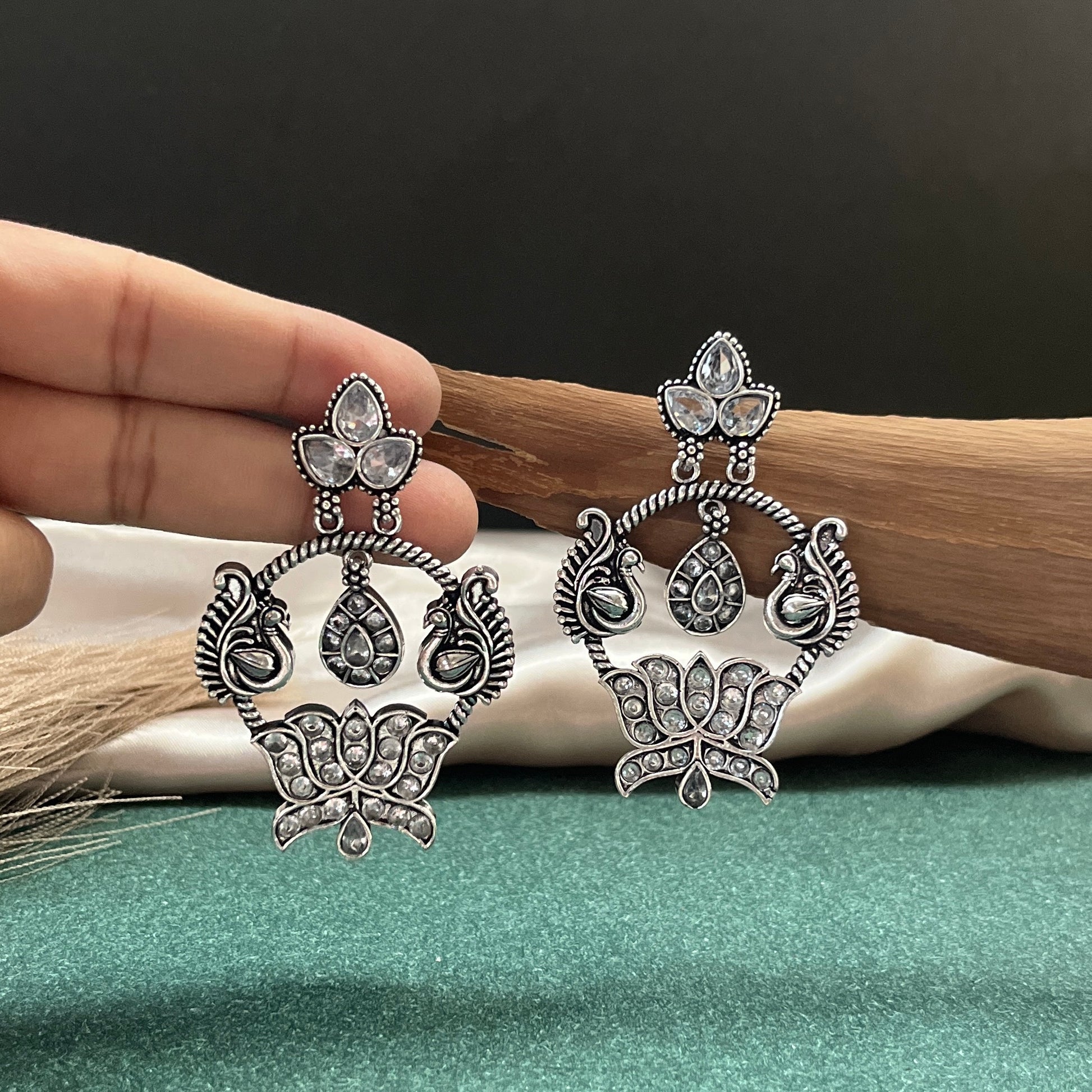 German silver look jhumka earrings oxidised finish with intricate temple design, perfect for festive wear,Vintage German silver look hoop earrings  boho inspired design for casual and traditional wear