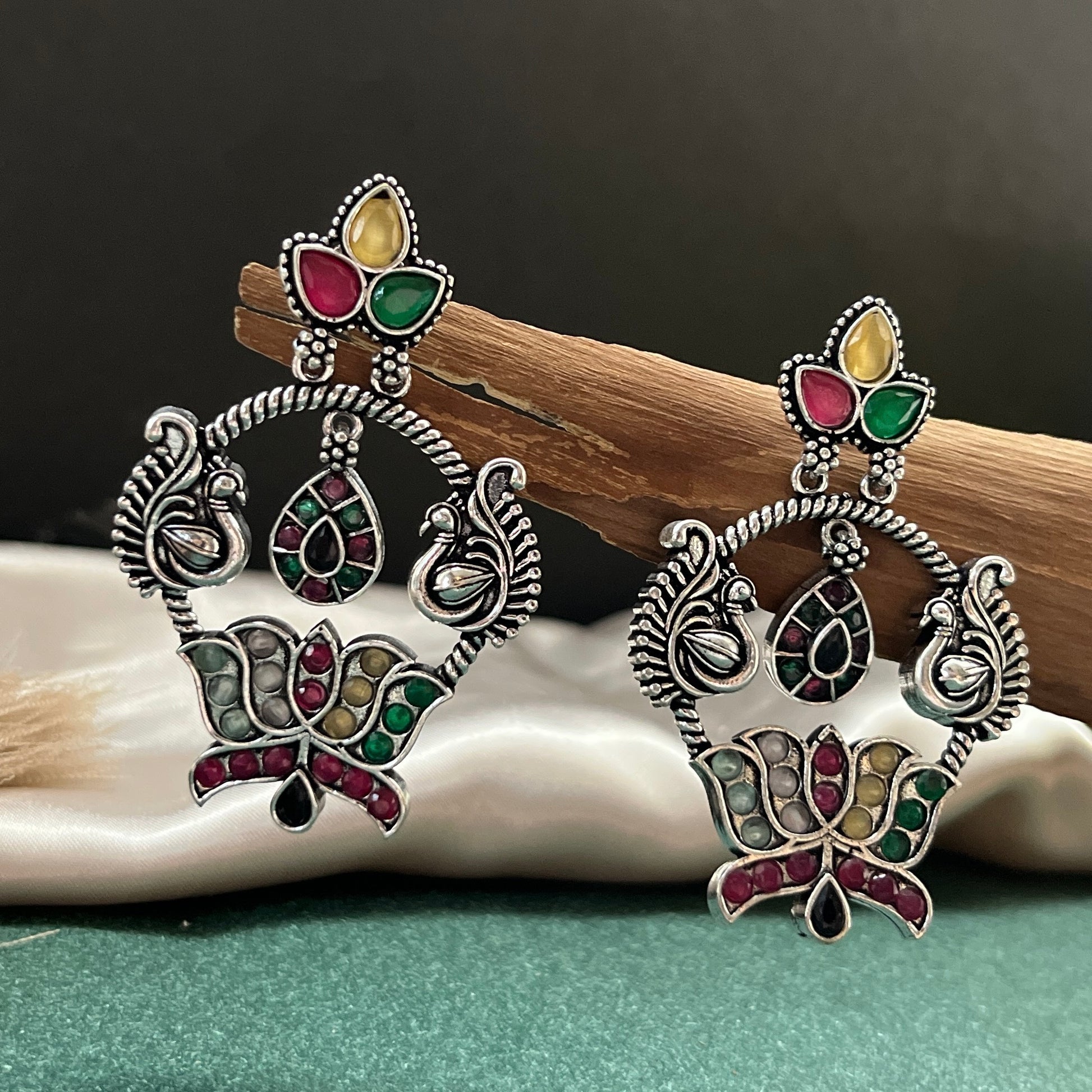 German silver look jhumka earrings oxidised finish with intricate temple design, perfect for festive wear,Vintage German silver look hoop earrings  boho inspired design for casual and traditional wear