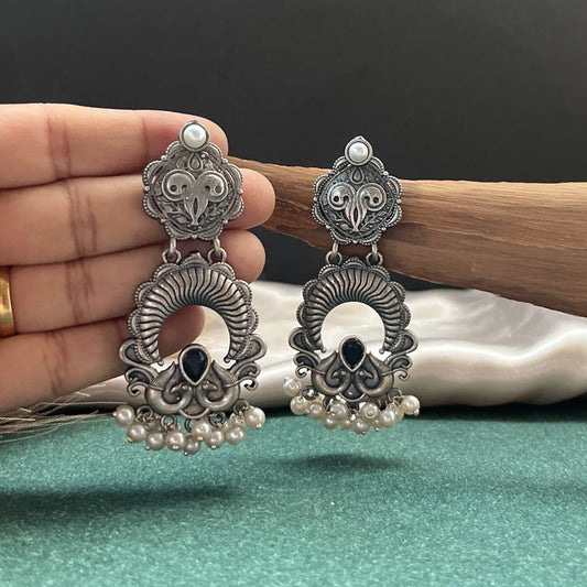 German silver look jhumka earrings oxidised finish with intricate temple design, perfect for festive wear,Vintage German silver look hoop earrings  boho inspired design for casual and traditional wear