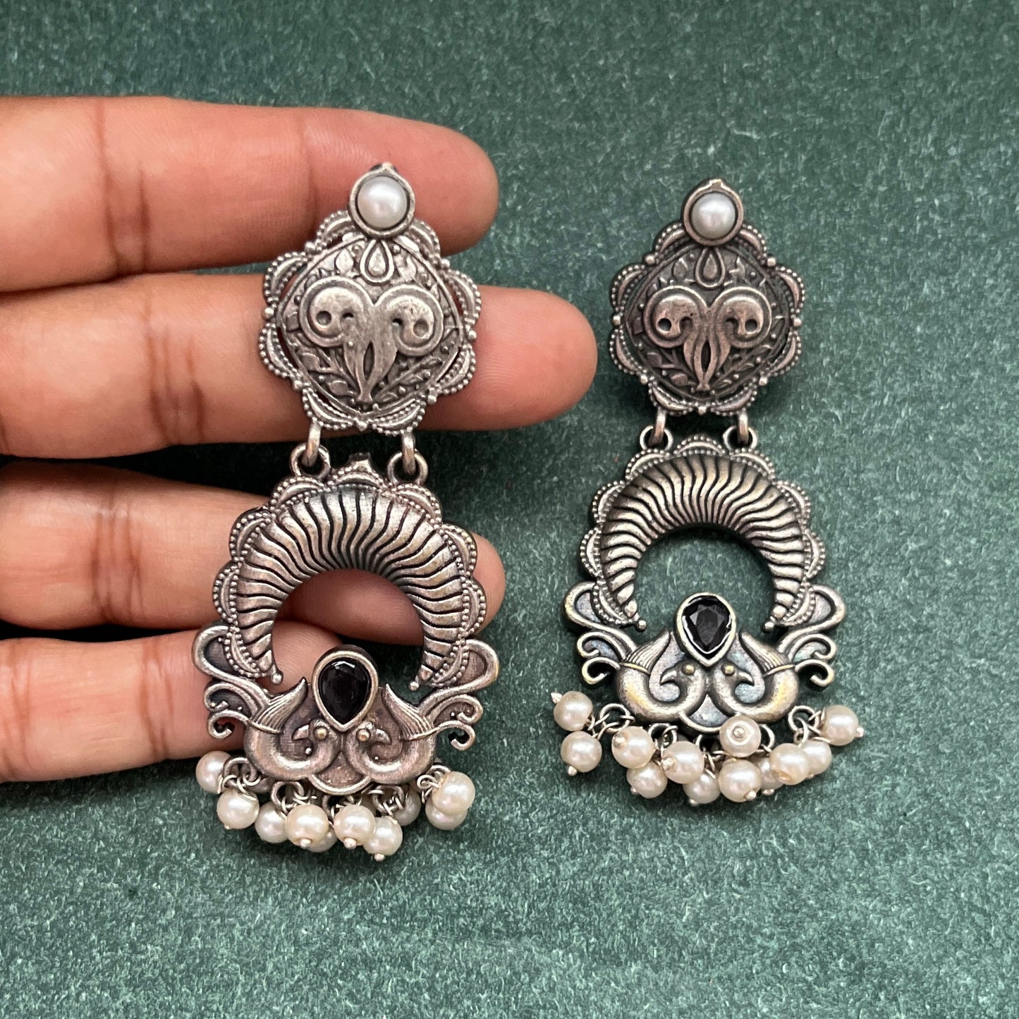 German silver look jhumka earrings oxidised finish with intricate temple design, perfect for festive wear,Vintage German silver look hoop earrings  boho inspired design for casual and traditional wear