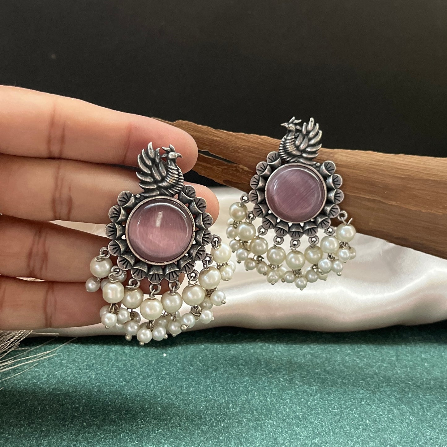 German silver look jhumka earrings oxidised finish with intricate temple design, perfect for festive wear,Vintage German silver look hoop earrings  boho inspired design for casual and traditional wear