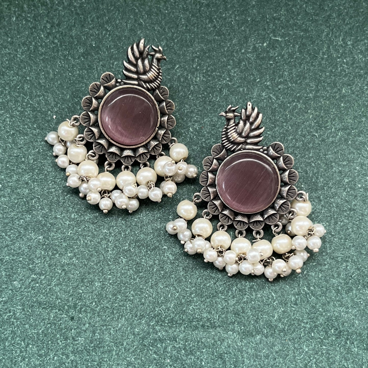 German silver look jhumka earrings oxidised finish with intricate temple design, perfect for festive wear,Vintage German silver look hoop earrings  boho inspired design for casual and traditional wear