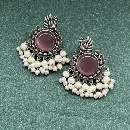 German silver look jhumka earrings oxidised finish with intricate temple design, perfect for festive wear,Vintage German silver look hoop earrings  boho inspired design for casual and traditional wear