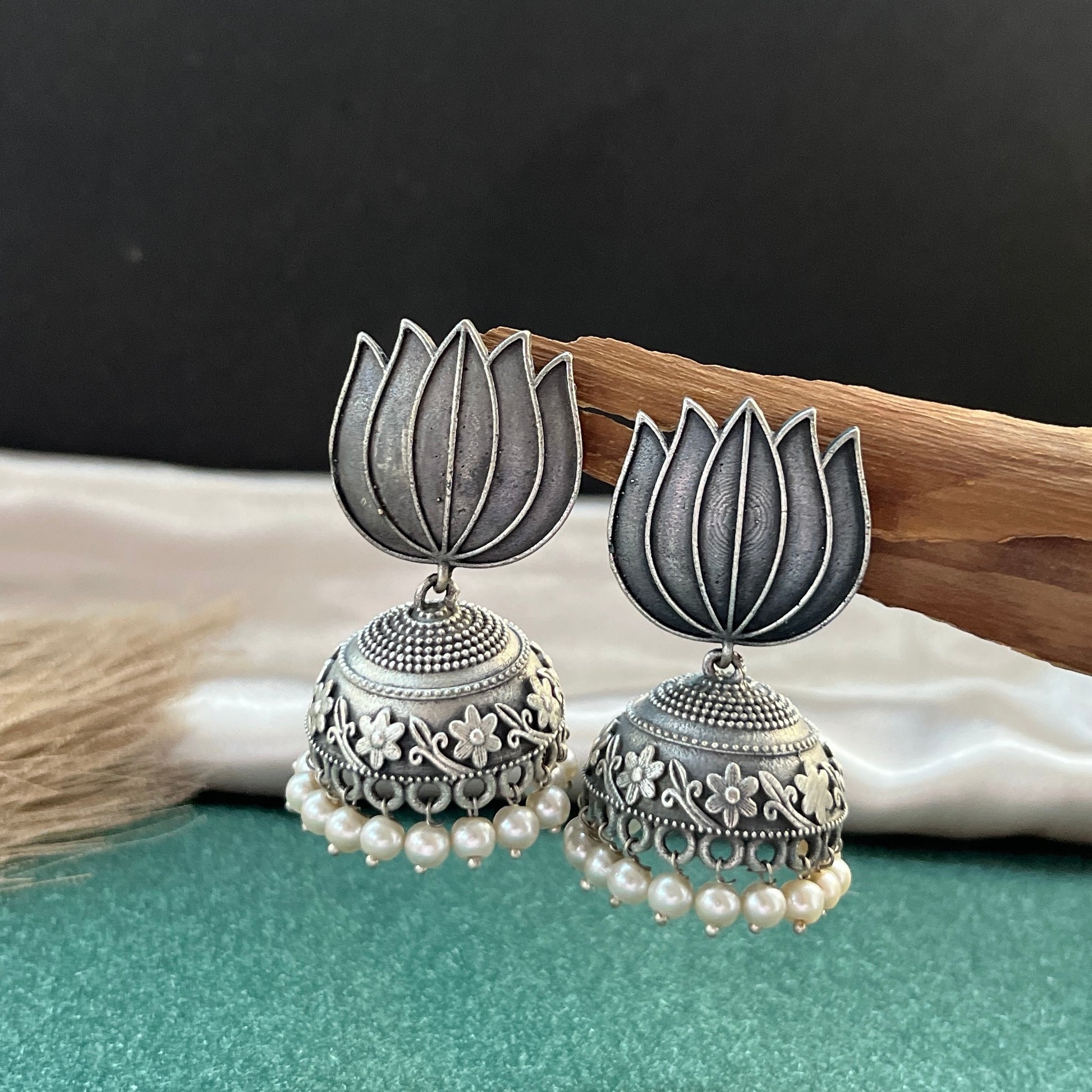 German silver look jhumka earrings oxidised finish with intricate temple design, perfect for festive wear,Vintage German silver look hoop earrings  boho inspired design for casual and traditional wear