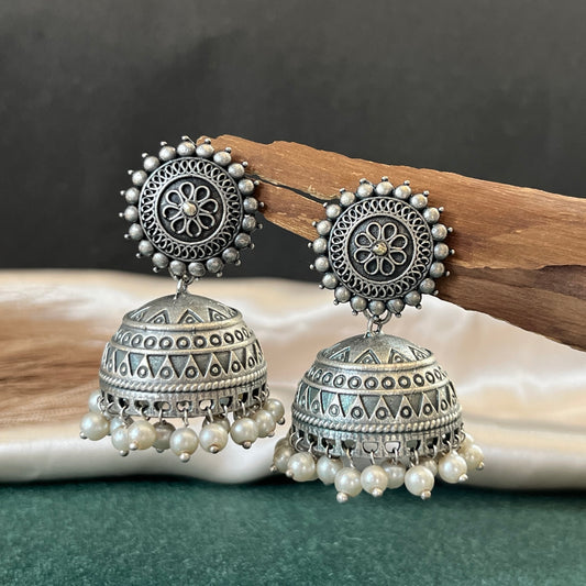 German silver look jhumka earrings oxidised finish with intricate temple design, perfect for festive wear,Vintage German silver look hoop earrings  boho inspired design for casual and traditional wear