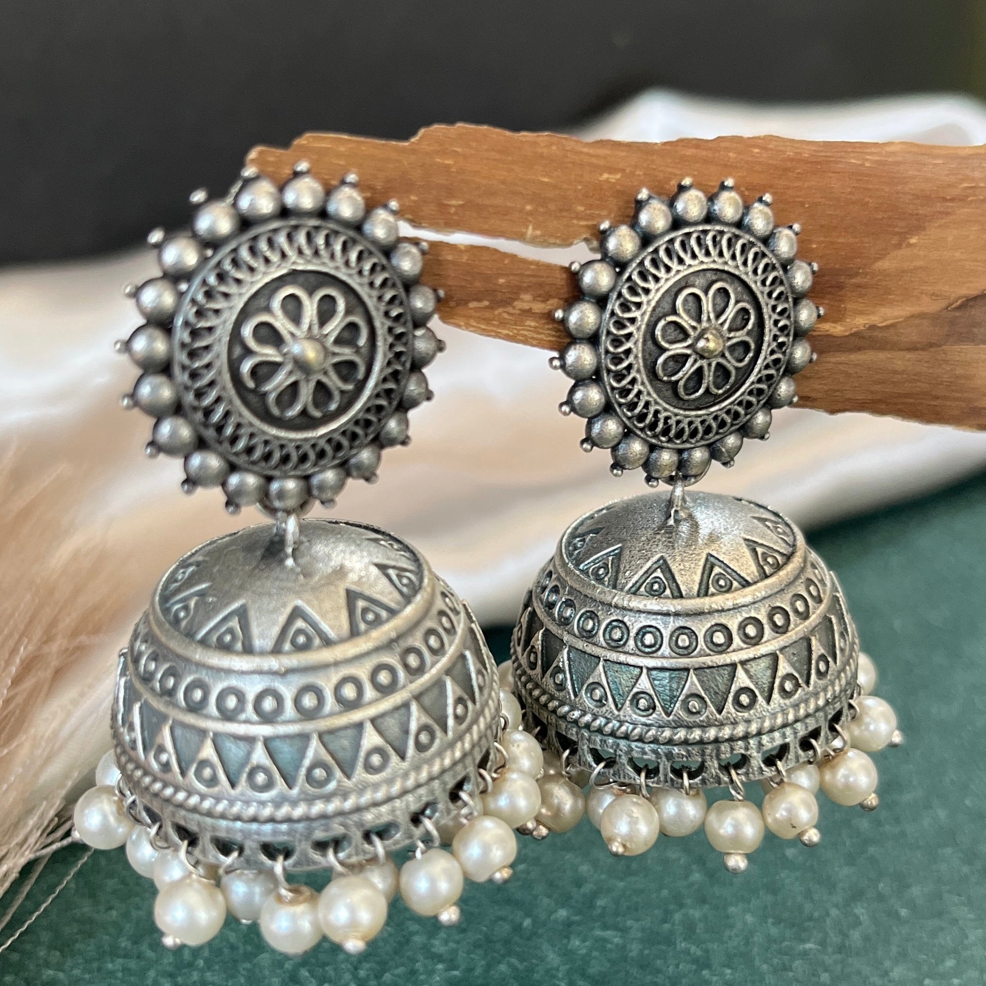 German silver look jhumka earrings oxidised finish with intricate temple design, perfect for festive wear,Vintage German silver look hoop earrings  boho inspired design for casual and traditional wear