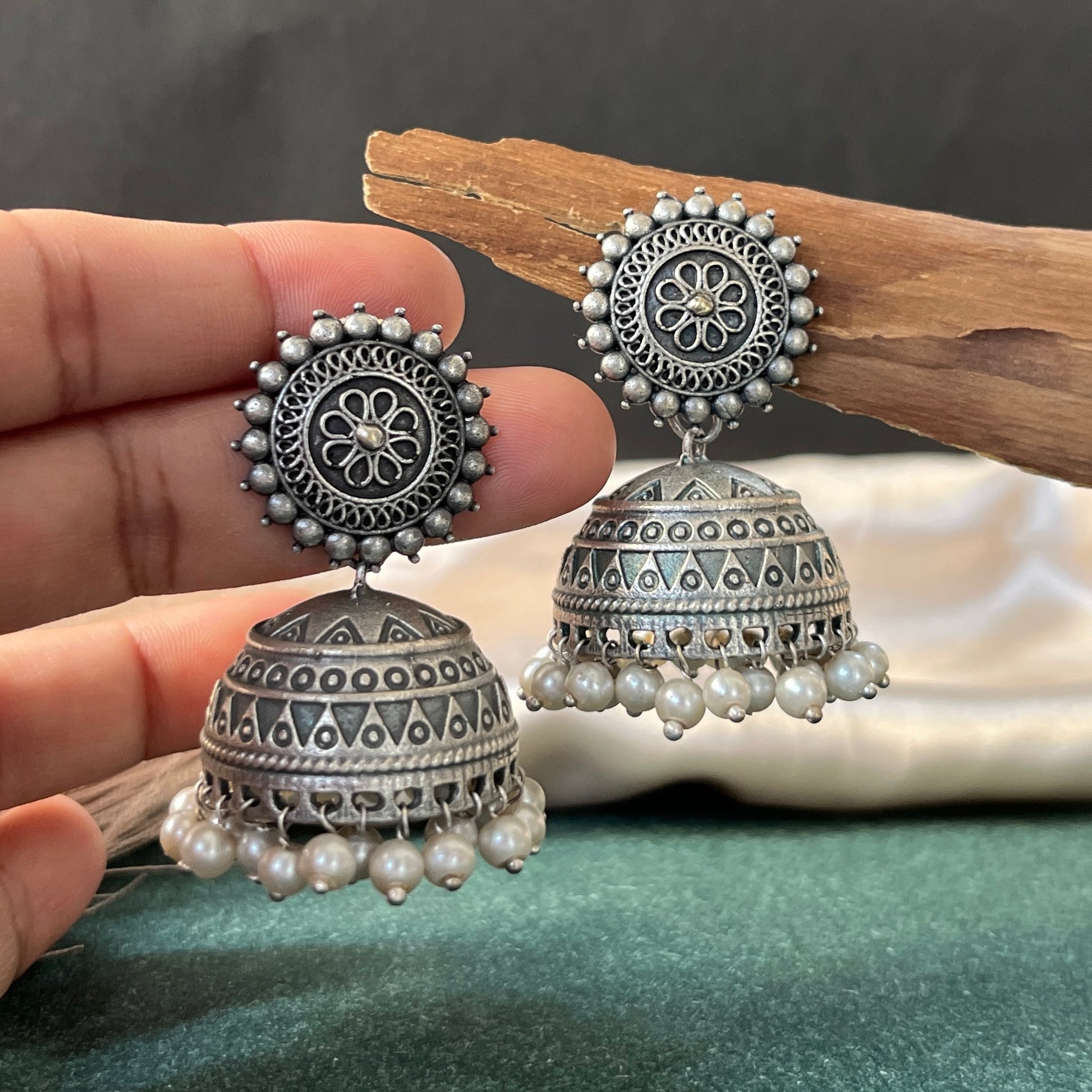 German silver look jhumka earrings oxidised finish with intricate temple design, perfect for festive wear,Vintage German silver look hoop earrings  boho inspired design for casual and traditional wear