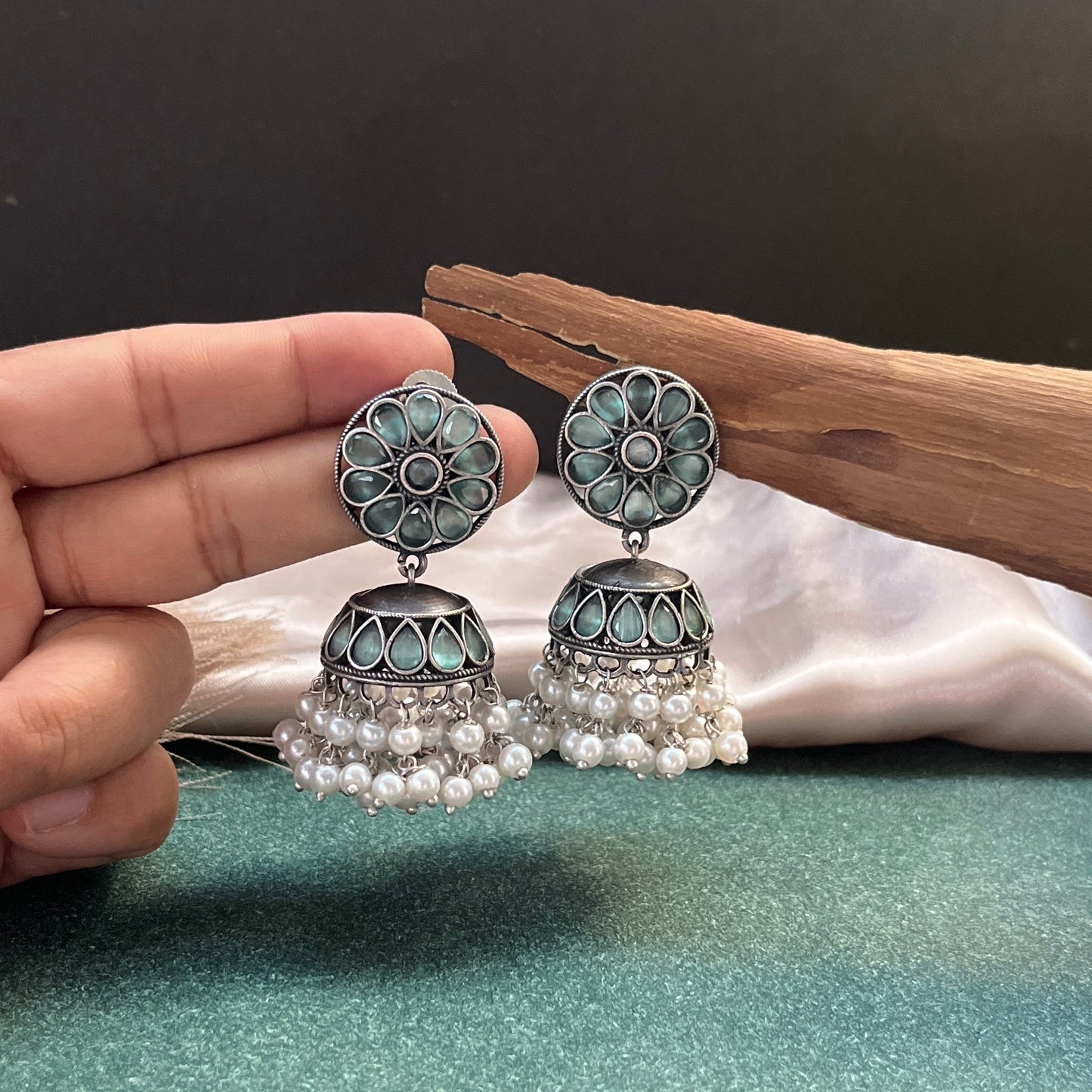 German silver look jhumka earrings oxidised finish with intricate temple design, perfect for festive wear,Vintage German silver look hoop earrings  boho inspired design for casual and traditional wear
