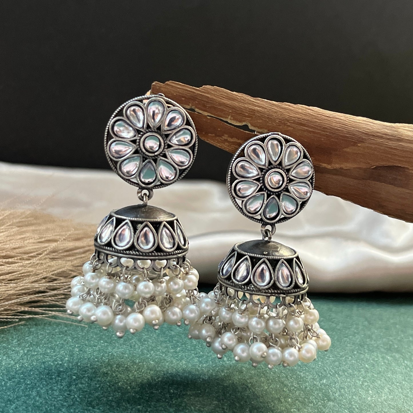 German silver look jhumka earrings oxidised finish with intricate temple design, perfect for festive wear,Vintage German silver look hoop earrings  boho inspired design for casual and traditional wear