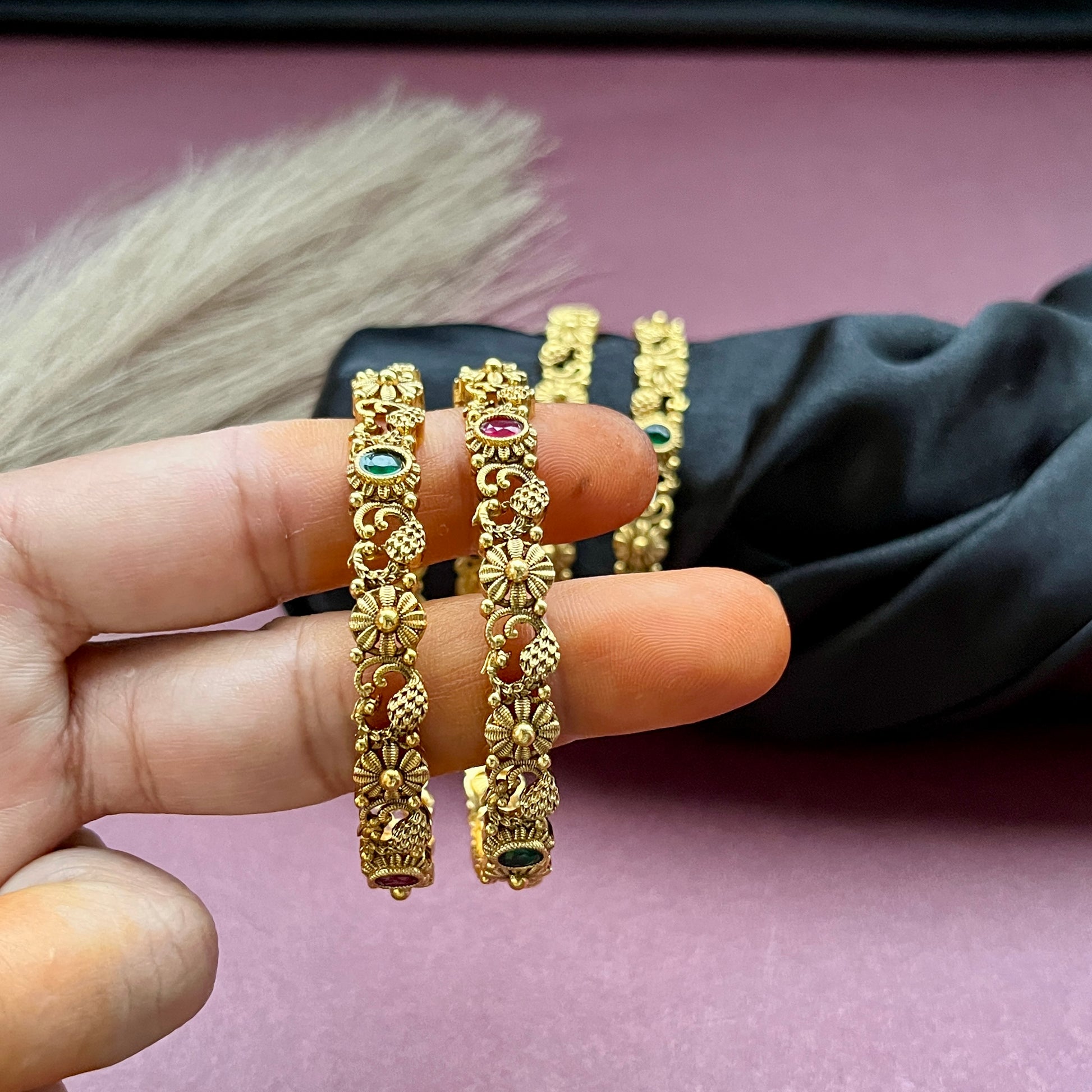 Traditional gold tone bangles with carved detailing imitation jewelry for weddings.Glossy gold look bangles in classic design  party wear imitation bangles for women