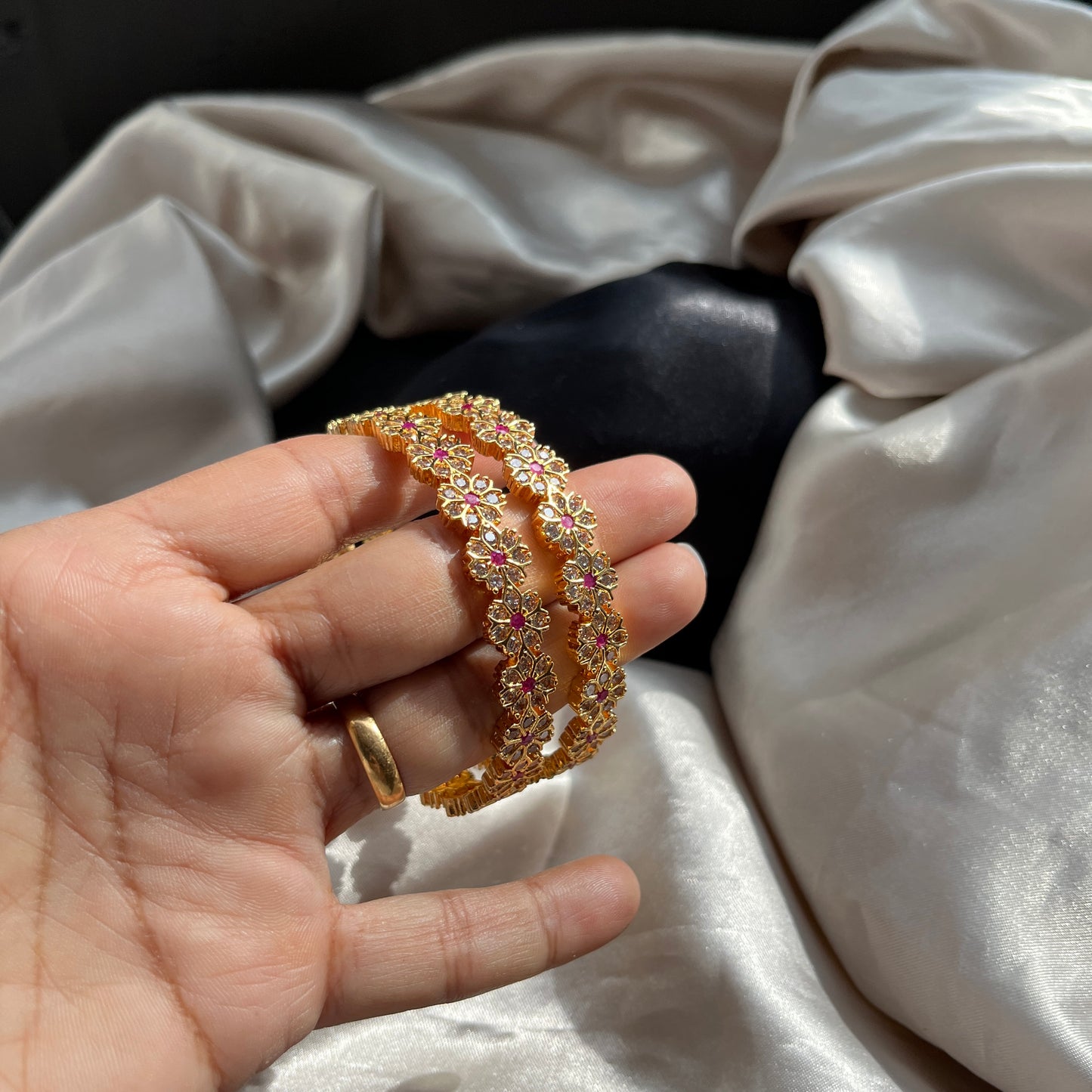 Traditional gold tone bangles with carved detailing imitation jewelry for weddings.Glossy gold look bangles in classic design  party wear imitation bangles for women