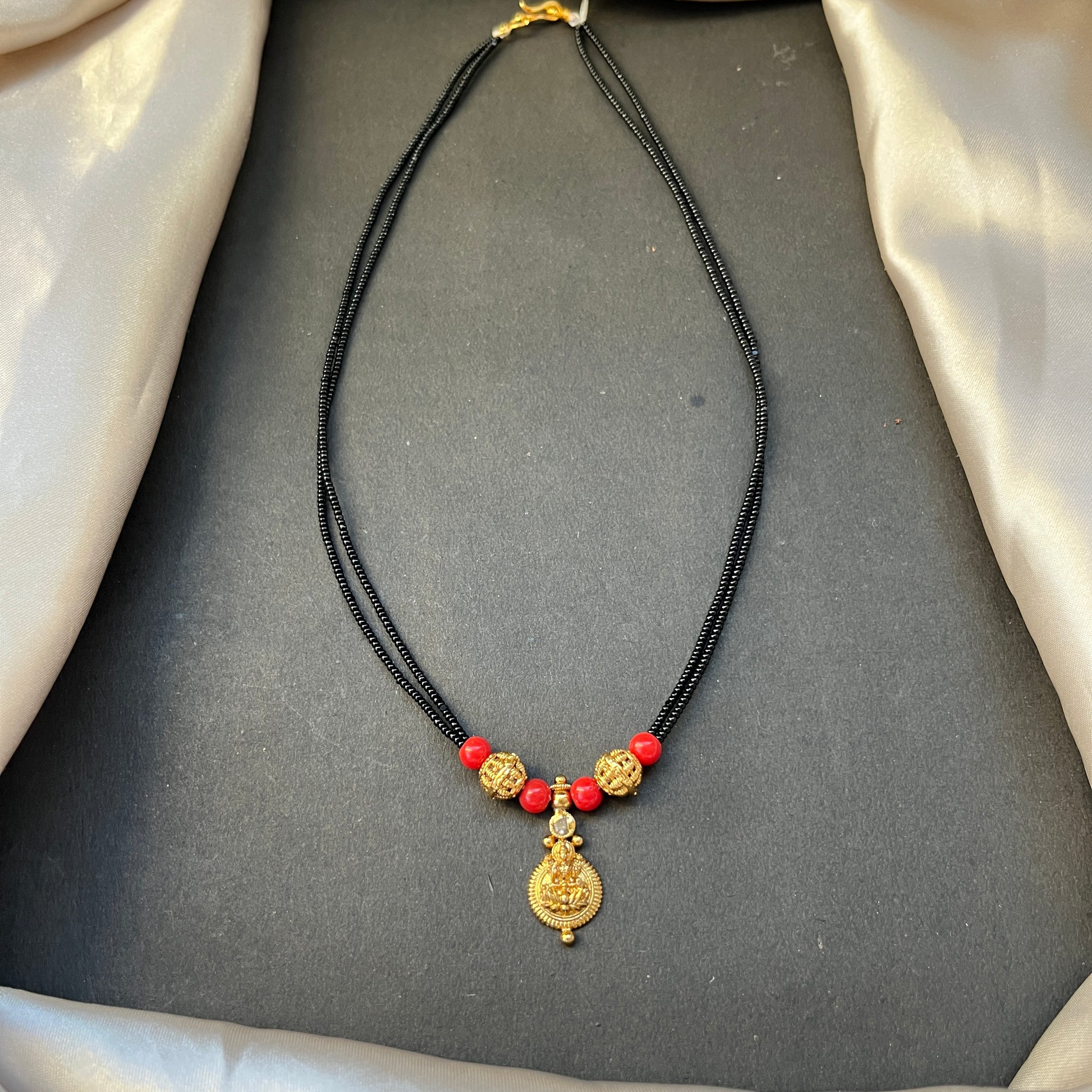 Kasu Coral Mangalsutra Traditional South Indian Mangalsutra Coral Beaded Necklace Kasu Coin Jewellery  Bridal Mangalsutra Design Heritage Jewellery Online  Handcrafted Indian Jewellery Festive Jewellery Collection Coral and Gold Tone Necklace Temple Jewellery Inspired