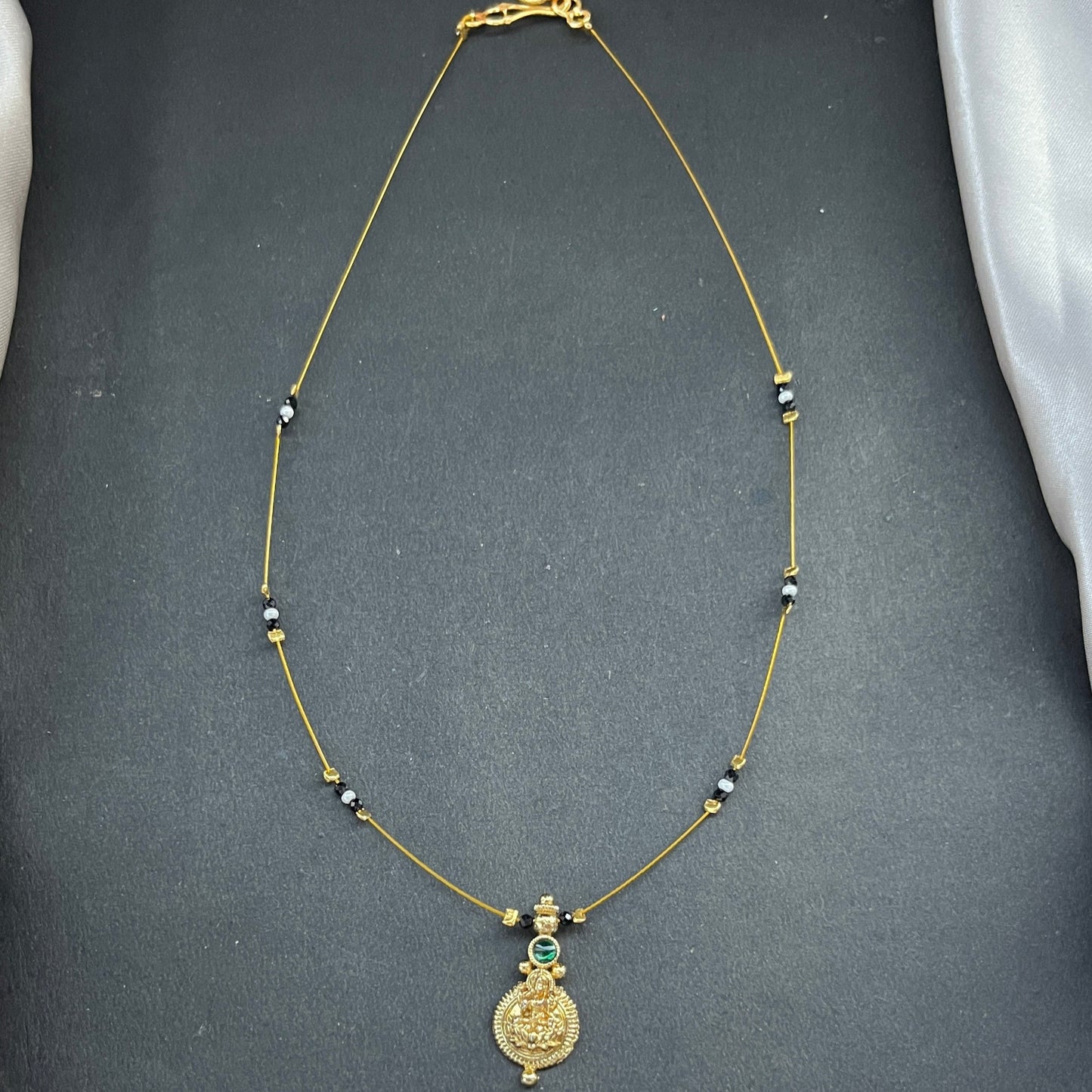 #KasuMangalsutra #CoralBeads #TraditionalJewellery #HeritageStyle #IndianJewellery #BridalEssentials #TimelessElegance #CulturalCharm