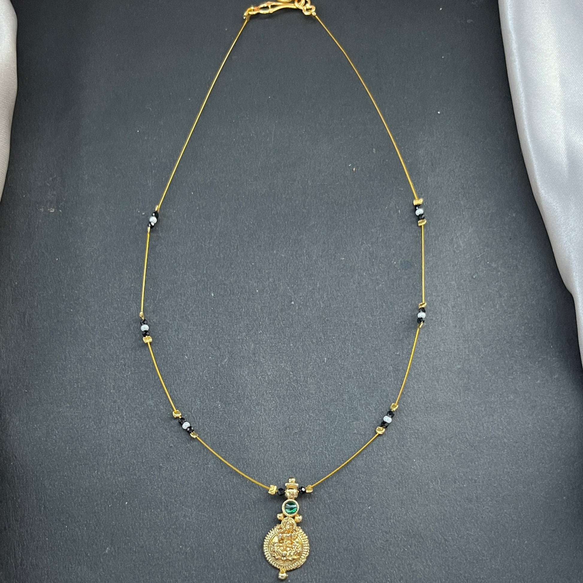 #KasuMangalsutra #CoralBeads #TraditionalJewellery #HeritageStyle #IndianJewellery #BridalEssentials #TimelessElegance #CulturalCharm