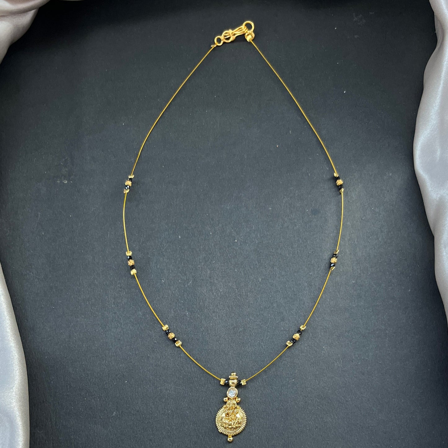 #KasuMangalsutra #CoralBeads #TraditionalJewellery #HeritageStyle #IndianJewellery #BridalEssentials #TimelessElegance #CulturalCharm