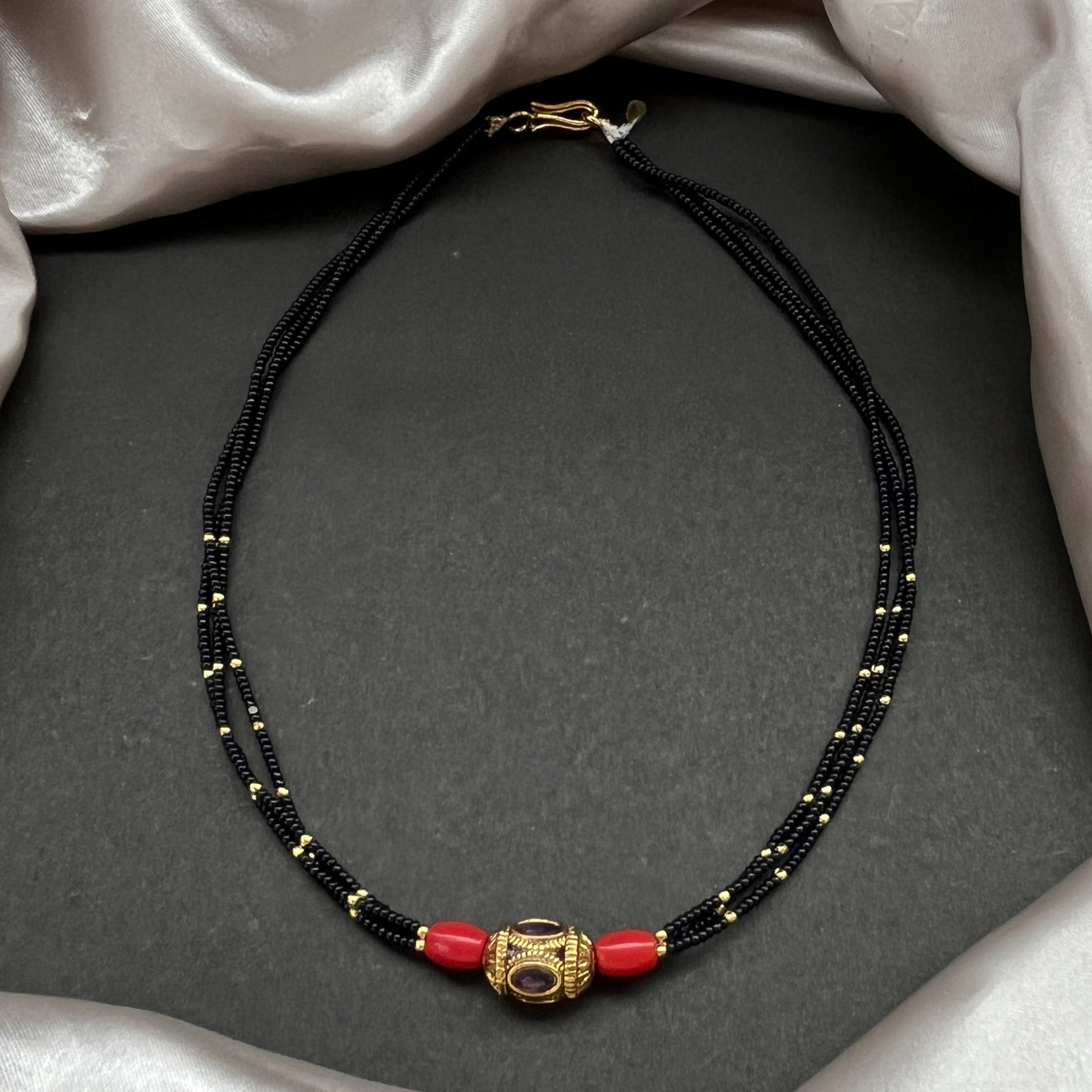 #KasuMangalsutra #CoralBeads #TraditionalJewellery #HeritageStyle #IndianJewellery #BridalEssentials #TimelessElegance #CulturalCharm