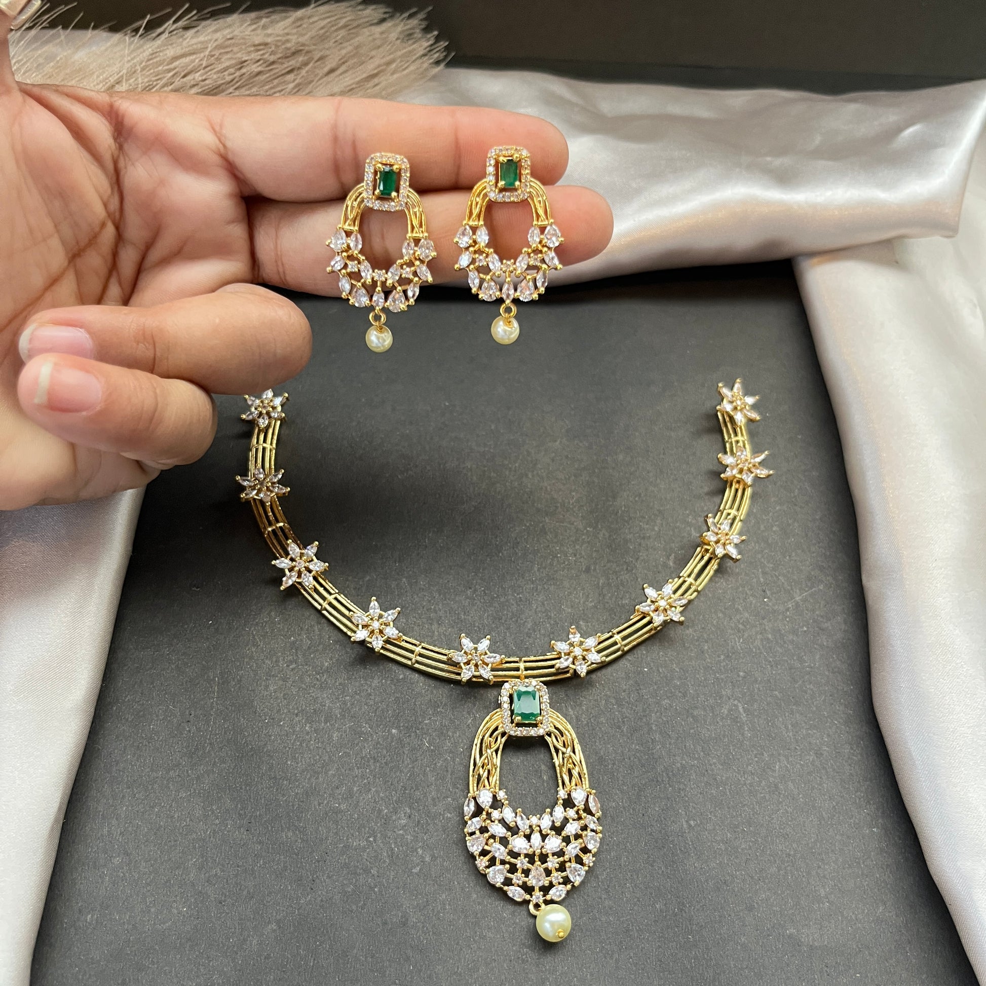 Gold look alike necklace set,Imitation jewelry,Artificial necklace set,Bridal / festive wear,Temple design / kundan / matte gold finish,Designer / traditional / ethnic