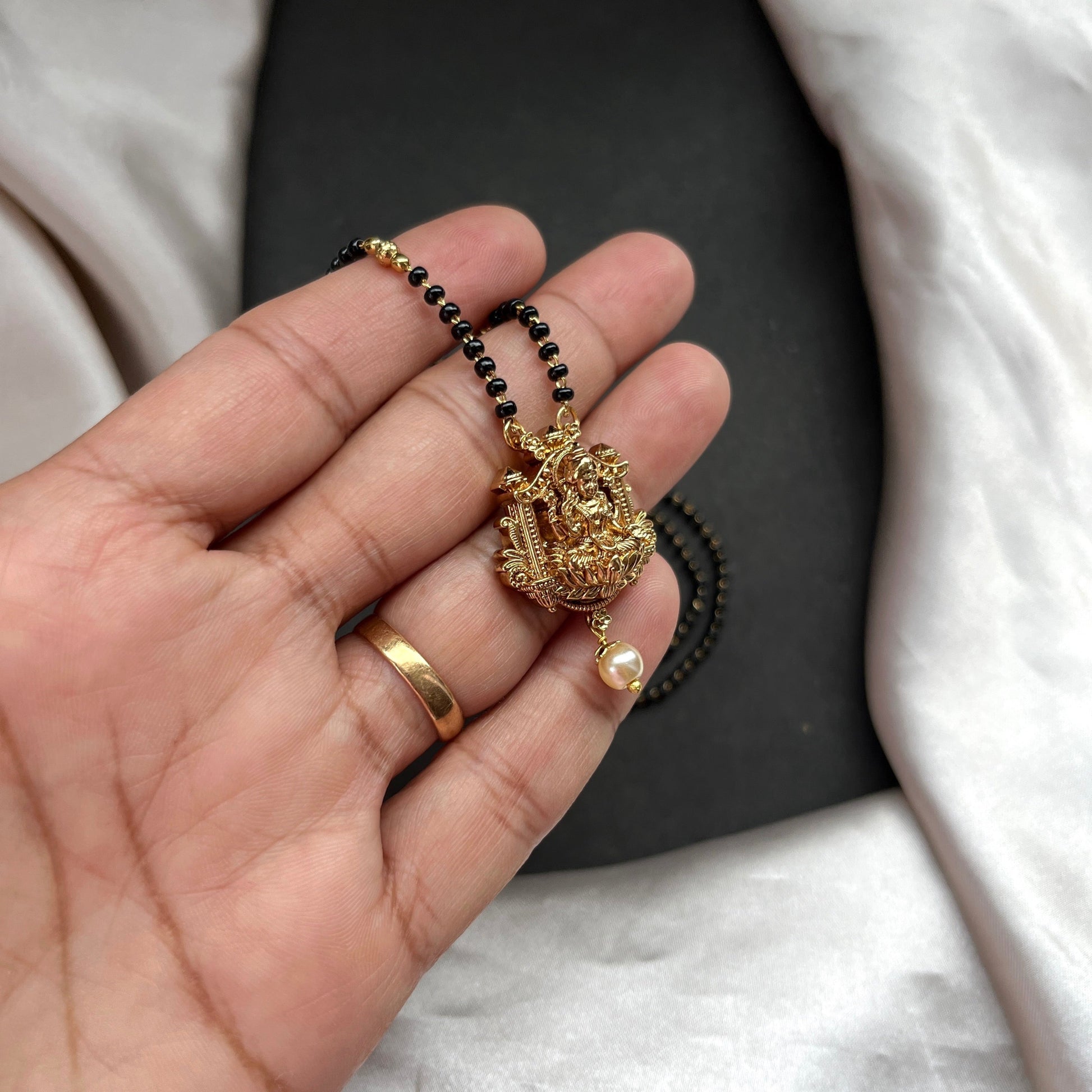 diamond mangalsutra,mangalsutra designs,wedding jewelry,black beads necklace,mangalsutra,mangalsutra designs,designer mangalsutra black beads,modern mangalsutra black beads,buy mangalsutra online black beads,mangalsutra price black beads,lightweight mangalsutra black beads