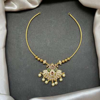 Gold look alike necklace set,Imitation jewelry,Artificial necklace set,Bridal / festive wear,Temple design / kundan / matte gold finish,Designer / traditional / ethnic