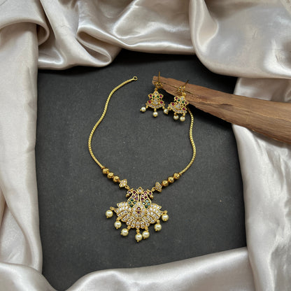 Gold look alike necklace set,Imitation jewelry,Artificial necklace set,Bridal / festive wear,Temple design / kundan / matte gold finish,Designer / traditional / ethnic